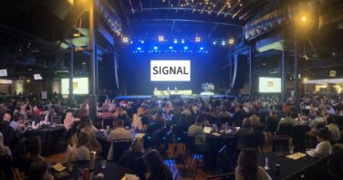 1000Watt Brand and Marketing Summit 2025 crowd stage view signal theme